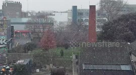 Snow flakes over Dublin city turn into a flurry of snow, transforming the landscape to a winter wonderland.