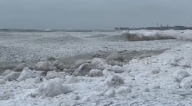 Lake Michigan frozen over amid Chicago winter