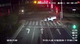 Drunk driver flips car after crashing into traffic island in southern China