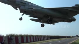 Plane watchers run for cover as Eurofighter has close call landing