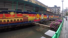 Admire this colourful street art brightening up canals in Thailand