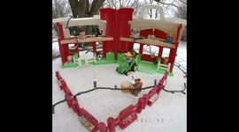 24-hour time lapse shows toy farm covered in 13 inches of snow in Iowa