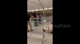 COVID-sniffing dogs screen spectators prior to Nuggets-Heat game in Miami