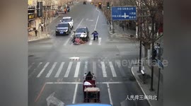 Driverless car slides along busy road and knocks over motorcyclists in China