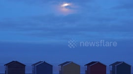 Full wolf moon rising in Kent, UK