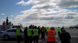 The space shuttle Enterprise, on top of a 747, lands in New York's JFK Airport.