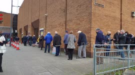 Large crowd of elderly people at the newly opened coronavirus vaccination centre at the main leisure centre in the city of Newport Wales UK