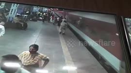 Alert staff saves man from getting crushed beneath train in western India