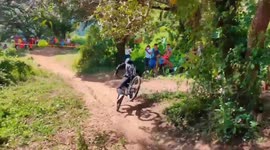 Thrills and LOTS of spills in terrifying downhill bike race in Philippines