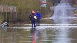 Dog walkers tackle flooding caused by Storm Christoph in West Yorkshire
