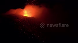 Mount Etna erupts spewing lava down slopes of volcano
