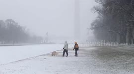 US: People Enjoy Snow As Winter Storm Moves Into Washington D.C.