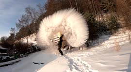 Hot water instantly freezes after being thrown into the air during weather stunt