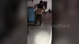 Forest officials rescue black cobra from residential premises in northern India