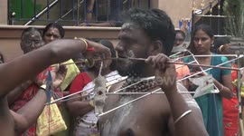 Hindus in southern India show devotion with extreme body piercing