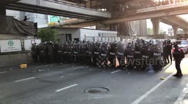 Riot police and protesters clash near Myanmar Embassy in Bangkok, Thailand