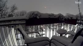 Snow piles up on New York balcony in timelapse as winter storm strikes US