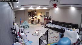 Chinese mother's quick reactions saves baby from being hit by falling frame