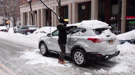 New Yorkers dig out from historic snowstorm as icy hazards remain