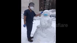New York snow man gets Botox injection from a nurse