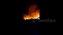 Firefighters battle blaze after Nigerian market bursts into flames