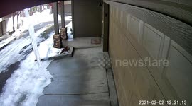 Newsflare Edit - CCTV captures huge '15-foot' icicle falling from 3rd storey of Arizona building