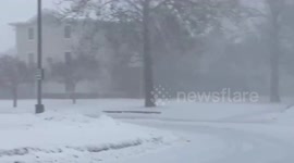 Iowan in near whiteout conditions following heavy snowstorm