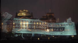 Activists demonstrate with a hologram ahead of the reform of EU in Berlin