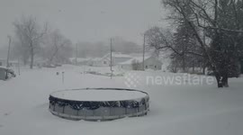 Blizzard-like conditions in Iowa severely reduce visibility