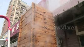 This shop in China uses a 30-storey tower to cook their steamed buns