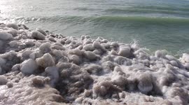 Large ice balls appear on Lake Huron shoreline