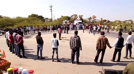 Protesters form human chain and block major highway in solidarity with Indian farmers