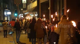 Scores of protesters join torch-lit anti-lockdown protest in Netherlands