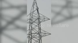 Youth climbs transmission tower over gambling disputes in central India