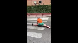 OUCH! Man performing street tricks kicks himself in the face, knocks himself out