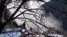 Indian villager screams as torrent of water swamps area after glacier breaks up