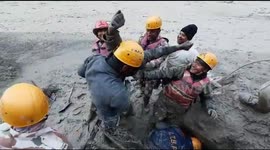 Indian rescuers pull worker alive from tunnel after devastating floods