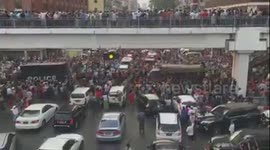 Civil Unrest - Protest in Yangon, Myanmar as military and police vehicles passing by
