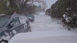 Motorists in Norfolk abandon cars as giant snow drifts block roads