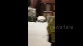 UK: Snowboarding On Street In Glasgow