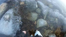 Man nonchalantly walks across Finnish lake with 'void under the ice'