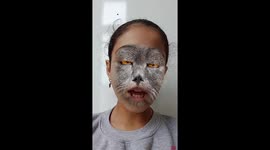 Funy crazy girl with a cat masks
