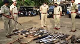 Police officials publicly smash silencer of several bikes in southern India