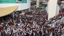 Thai police scuffle with protesters as anti-monarchy banner is removed