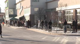 Long lineup at grocery store are COVID-19 coronavirus pandemic lockdown and retail restrictions continue in the Toronto Canada area