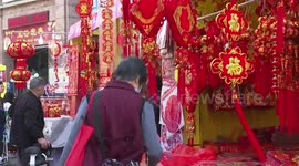 Chinese residents purchase decorations preparing for Lunar New Year