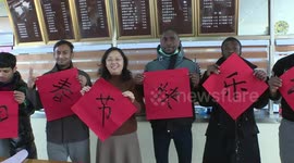 International students in China write couplets and make dumplings to celebrate Chinese New Year