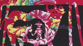 Folk artist crafts fabric oxen decorations to welcome the Chinese New Year