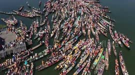 Dozens of long boats float on Myanmar lake as ethnic minorities protest coup