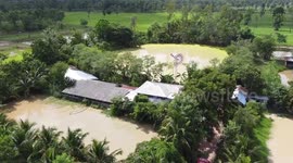 Thai farmer builds his own wind turbine that provides electricity for him and neighbours